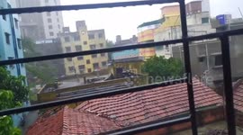 Cyclone Amphan hits India blowing tin roofs off apartment block in Kolkata