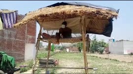 India man quarantine himself in makeshift tower on his farmland due to lack of space in his house