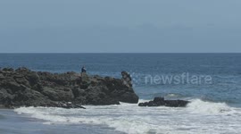 Waves Crashing On Rock Peninsula