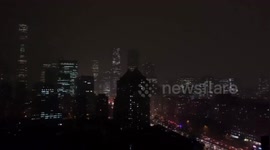 Sky turns black in Beijing when huge rainstorm hits the city