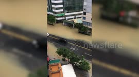 Heavy rain causes flash floods in Taiwan closing schools and offices