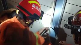 Chinese firefighters pry open parcel locker to free toddler