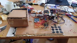 Credit card scanner, six-digit code and facial recognition needed to access this cardboard box