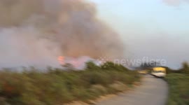 Men Face Raging Fire