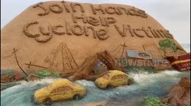 Indian sand artist creates sculpture on Cyclone Amphan in southeast India