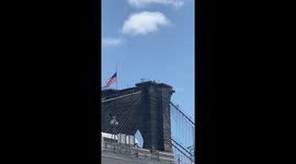 Cops climb Brooklyn bridge to suicidal man