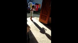 Little girl dancing with the shadow