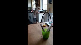 My daughter putting her pen away.