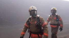 Firefighters tackle huge blaze at Rochdale scrapyard with 30 cars inside