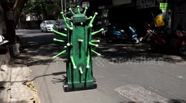 Coronavirus-shaped robots deployed in India to disinfect streets