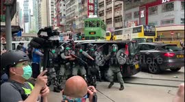 Hong Kong police fire water cannons at protest against proposed security law