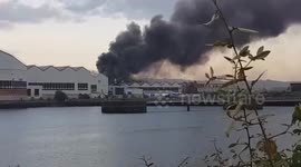 Huge fire engulfs Bombadier warehouse in Belfast in Northern Ireland
