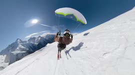 Daredevil flies inches from ground above snowy French Alps