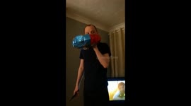 A man, a helium balloon and a dog
