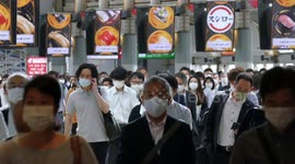 Workers return to offices in Japan as country lifts COVID-19 state of emergency
