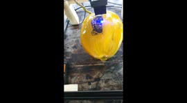 Vietnamese shop uses lasers to decorate coconut shells