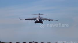 Extreme jet blast from a Royal Air Force Boeing C-17 Globemaster as it performs go around manoeuvre at Bristol Airport, UK