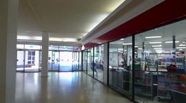social distancing floor queue stickers hot sunny day getting into banks