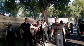 Paris police detain one man and disperse groups drinking alcohol along Seine river