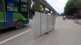 Flying planks? Unbelievable, Bike drives with huge plank on busy road in Vietnam