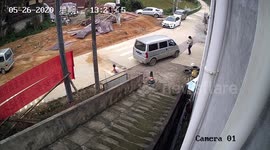 Chinese girl miraculously survives being run over by minibus