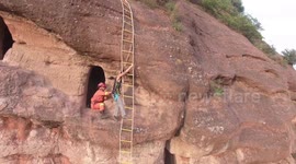 Chinese firemen rescue man trapped in 70-metre-high cave on vertical cliff