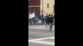 Police try to take charge at Minneapolis precinct during protests against George Floyd's killing
