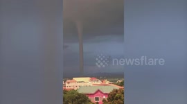 Triple waterspout forms off coast of island in the Philippines
