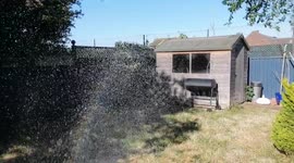 Hospipe creates water which creates rainbow effect when combined with sunshine.  Longer video- part 2.