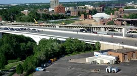 Police scattering protestors from I35W Bridge