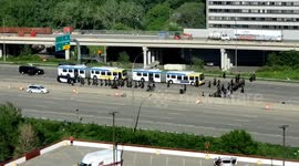 National guard shows up to the scene on Metro buses