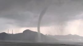 Huge waterspout swirls over river in southern China
