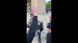 Police officers in Washington State kneel in solidarity with protestors