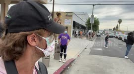 British photojournalist selfie video in middle of peaceful George Floyd protests near CBS Studio on Los Angeles in front of LAPD police who are surrounded by protestors