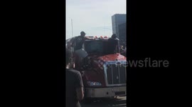 'He almost killed us!' Moment protesters try to halt moving semi during Minneapolis protest