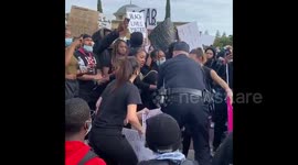 Heartfelt moment chief police hugs crying protestor in Oakley California