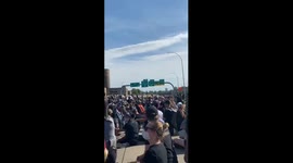 Minneapolis protesters chant 'no justice no peace prosecute the police' during rally on I-35W Bridge