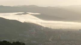 Watch this amazing cloud fall in Barcelona city as fog rolls in from the mountains