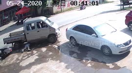 Helmet saves Chinese biker's life after truck runs over her head