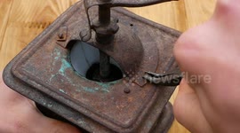 Rusty coffee grinder dating back to the 1900s is restored in satisfying footage