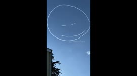 Plane pilot draws large smiley face in the sky above UK city