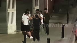 7 Men, 1 Hookah. Breaking lockdown rules. Group of 7 men sharing hookah and smoking on a street corner.