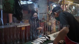 Plastic guards installed at market in Indonesia as country slowly reopens