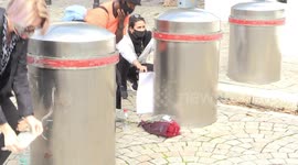 Capetonians in solidarity with black lives matter place flowers at the gates of parliament in memory of thoise killed by police brutality