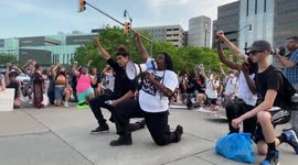 Detroit protesters take a knee for George Floyd in emotional rally