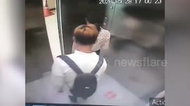Thai man caught taking pictures under woman's skirt in elevator