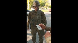 Showing card trick to the National Guards in Sacramento