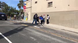 Group of seven young adults light firework and throw at Police in Santa Monica