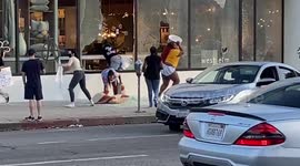 Looters break windows and raid Los Angeles furniture Store