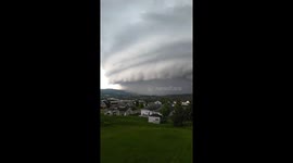 US man amazed by 'arcus cloud' rolling in across rural New York State